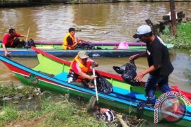 Mahasiswa Unmul Kembali Rawat Sungai Karang Mumus