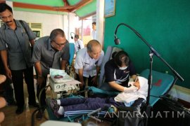 PWI Jatim-YPAPK Gelar Pengobatan Gratis  Korban Banjir 