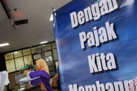 Ajak Warga Taat Pajak, Bupati Meranti Janjikan Hadiah Umroh!!