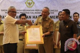 Pemkab HST Raih Opini WTP