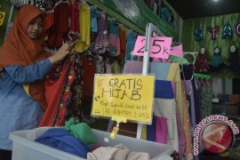 Toko Busana Muslim Denpasar Gratiskan Penghafal Ar-Rahman