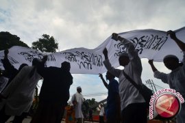 Simpatisan HTI tertib bacakan ayat-ayat Al-Quran