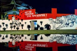 Warga Pekanbaru Dihebohkan Dengan Kehadiran Mural Harimau Raksasa