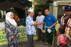 Bupati Tapin Bagikan 500 Bungkus Daging Qurban