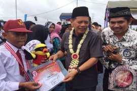 Tapin Peringati HUT PGRI dan HGN
