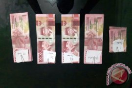 Two Balangan residents arrested carrying counterfeit money