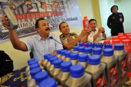 PEMALSUAN MEREK PELUMAS