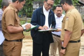  Jelajahi Pedesaan, Bupati Kampar Lihat Langsung Kaeadaan Desa Yang Akan Dibenahi