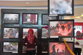 Pameran foto Energy of Indonesia for Asian Games Page 1 Small