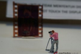 Fotografi unik melalui objek figur mini