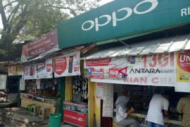 Omzet Penjual kartu perdana seluler turun 60 persen