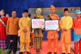 Bupati Imbau Masyarakat Dukung Bujang Dara Bengkalis