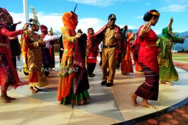 Kain Ulos penyambung budaya Sumut dan Papua
