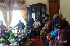 Bupati Bener Meriah berikan jaminan sosial Ketenagakerjaan aparatur desa