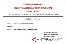 Koalisi masyarakat islam kutuk pembakaran bendera tauhid