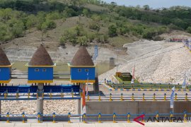 Newly completed dam being filled with water