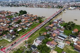 PEMBANGUNAN JEMBATAN MUSI IV RAMPUNG Page 1 Small