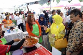 Menyatukan perbedaan melalui marandang