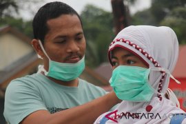 Pembagian masker gratis untuk anak sekolah