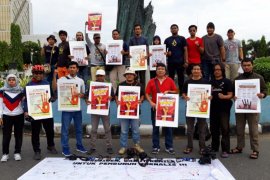 Aksi Damai Jurnalis Pekanbaru Desak Jokowi Cabut Remisi Pembunuh Wartawan