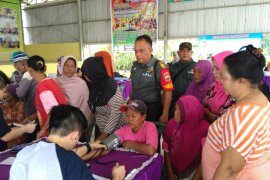 UNPRI-Koramil 08/Pantai Cermin beri pengobatan gratis