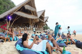 Regulation facilitating foreign tourists to work from Bali: Minister