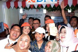 Menteri BUMN Tinjau Booth BNI Page 1 Small