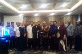 S Kalimantan umrah travel report Garuda ticket monopoly to KPPU