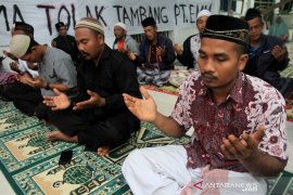 Doa tolak perusahaan tambang PT EMM