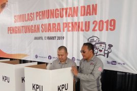 KPU ingatkan pemilih akan larangan swafoto di bilik suara.