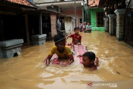 BANJIR LUAPAN SUNGAI CILIWUNG Page 1 Small