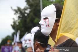 Jurnalis bertopeng air mata darah peringati Hari Buruh