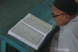 Isi kegiatan Ramadhan dengan baca Quran Page 5 Small