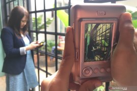 Kiat menghasilkan foto polaroid keren