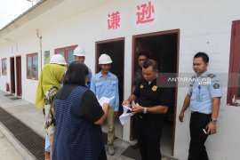 Sembilan pekerja China lari saat razia imigrasi