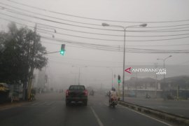 Di Pontianak murid TK dan siswa SD terpaksa diliburkan gara-gara kabut asap