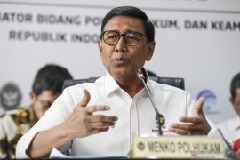 Two named in racist speech case against Papuans