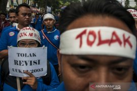 Aksi Tolak Revisi UU Ketenagakerjaan