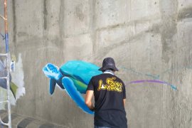 Polisi tangkap satu orang pengeroyok pelukis mural underpass Unila