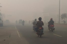 Kabut asap selimuti "kota seribu sungai" Banjarmasin