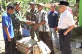 Koramil Haruai -  Baznas bedah rumah tidak layak huni