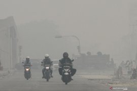 Sebulan berlalu, Pekanbaru masih terus diselimuti kabut asap karhutla