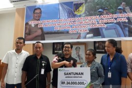 BPJS-TK santuni peserta padat karya korban bencana di Sigi