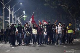 Indonesian students hold rallies to protest law changes