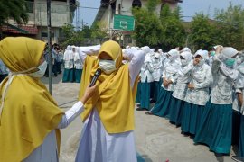 Dinkes Aceh Barat sosialisasikan penggunaan masker untuk  pelajar