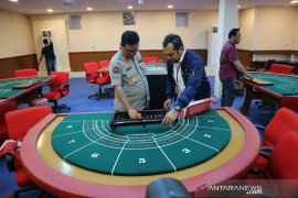 Satu tewas saat polisi gerebek kasino di Apartemen Robinson
