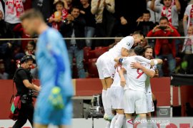 Hasil Grup G: Polandia lolos, empat tim lain berebut satu tiket  lagi