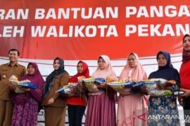 Pekanbaru menjaga ekonomi keluarga pra sejahtera lewat BPNT