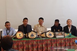 Daud Yordan bertahan di kelas ringan super setelah menjadi juara dunia