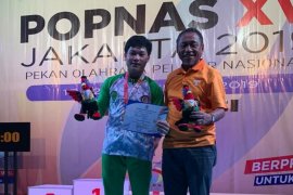 Lifter Kaltim Muhammad Faathir pecahkan rekor dunia di Popnas